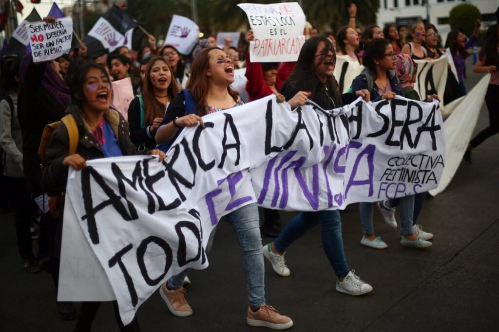 Demonstrators take part in a march on International Women's Day in Mexico City