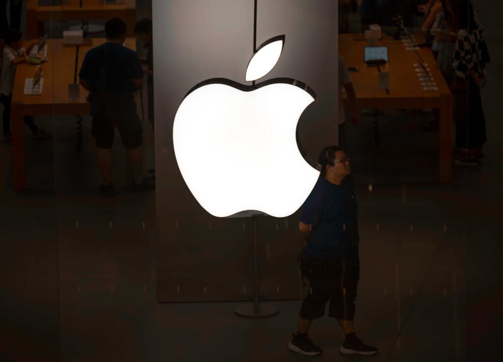 Apple unveils latest iPhone as France warns about older model's radiation emission